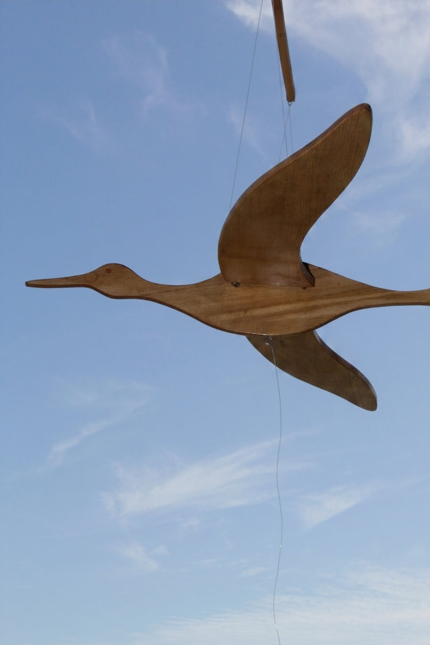 Pájaro decorativo articulado de madera de Raulí